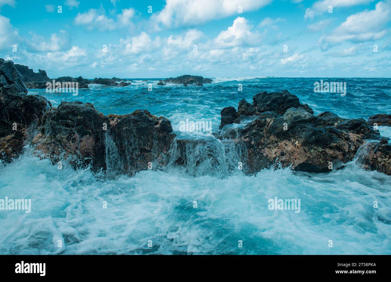 Rock and sea. View of turuoise water and lava rocks beach, atlantic ...