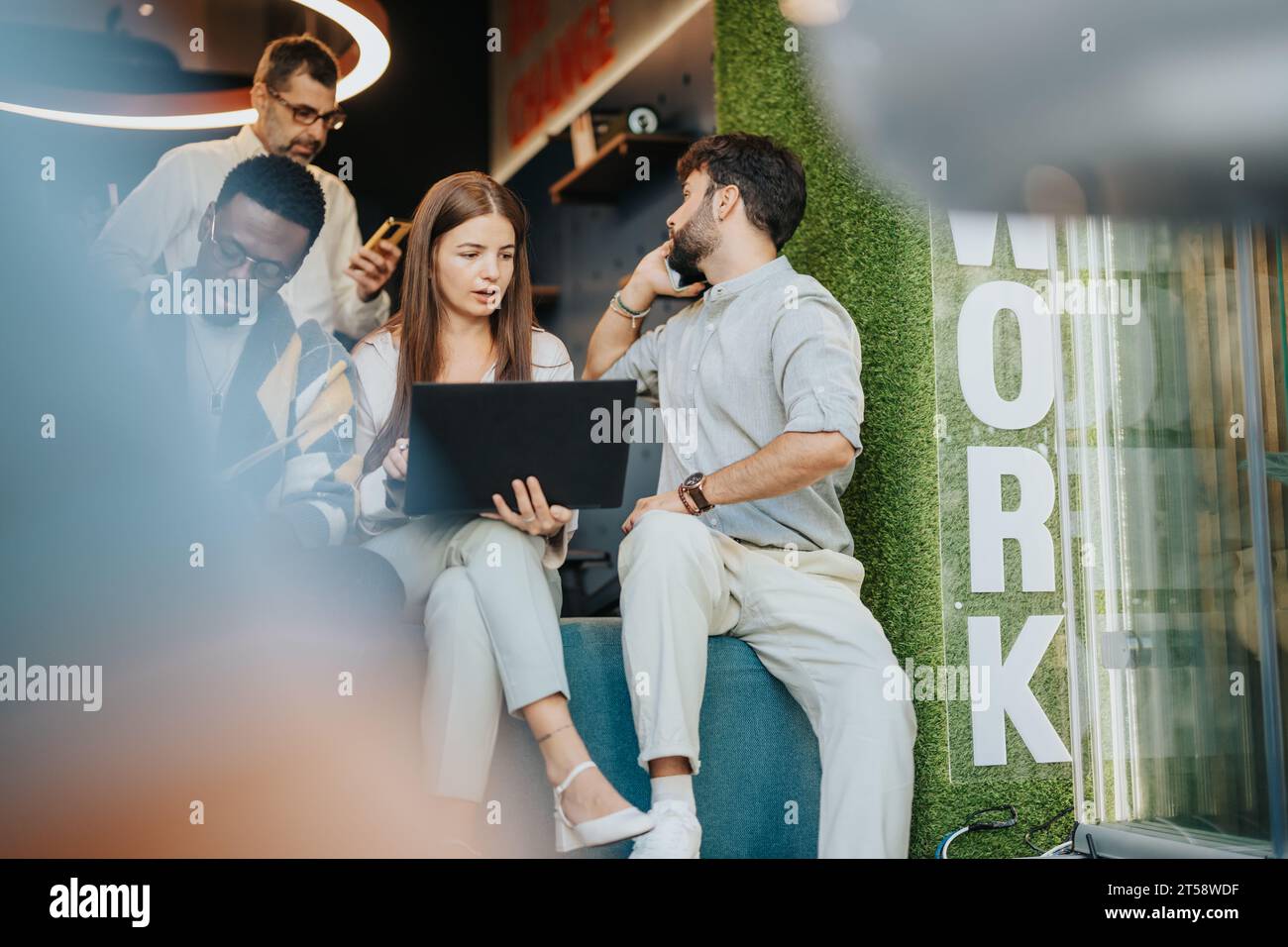 Employees discuss business sitting on threshold. They analyze market