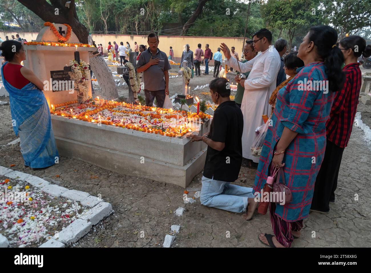 Kolkata, India. 02nd Nov, 2023. An Indian Catholic family lit candles