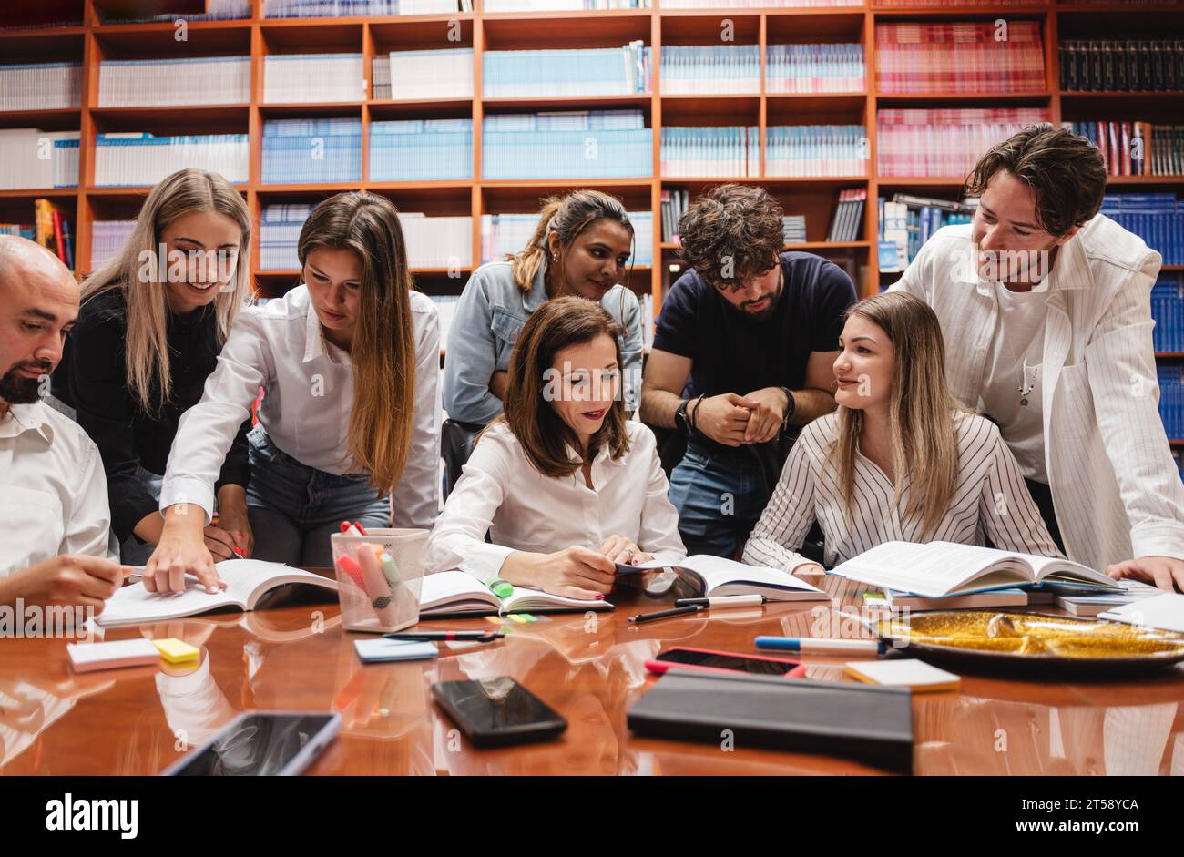 Group students working teacher hi-res stock photography and images - Alamy