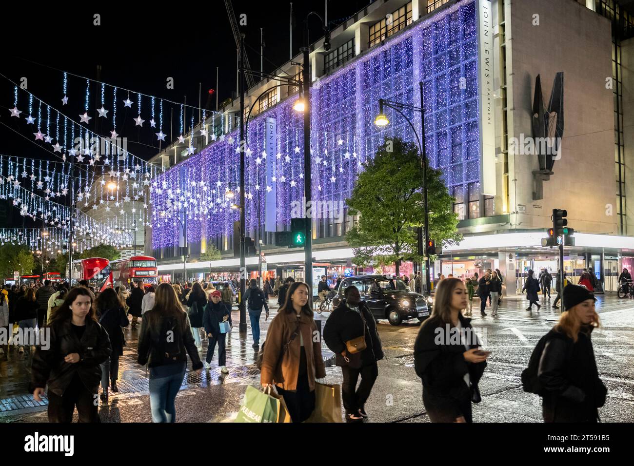 London, UK. 3 November 2023. People pass John Lewis beneath the