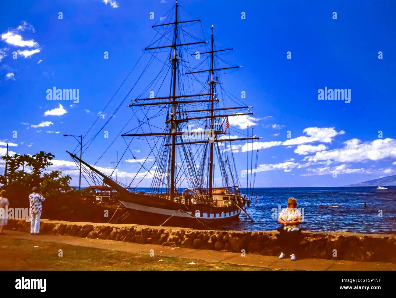 Lahaina, Maui, Hawaii, June 2, 1986 - Old Slide of Whaling Ship, The Carthaginian in Lahaina Harbor, Tied to Coral Pier, on a Beautiful Sunny Summer D Stock Photo