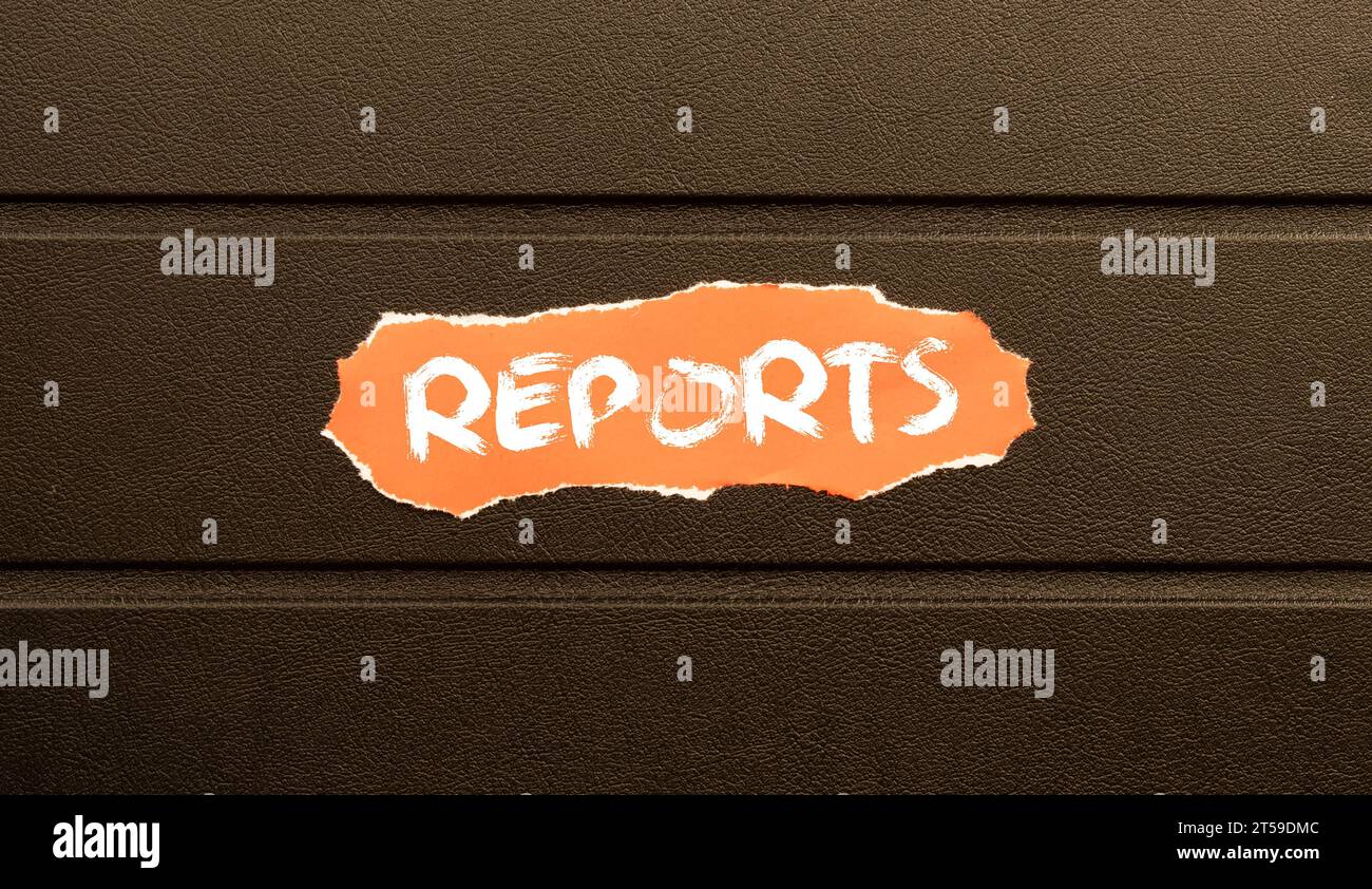Reports word on card index paper. Stock Photo