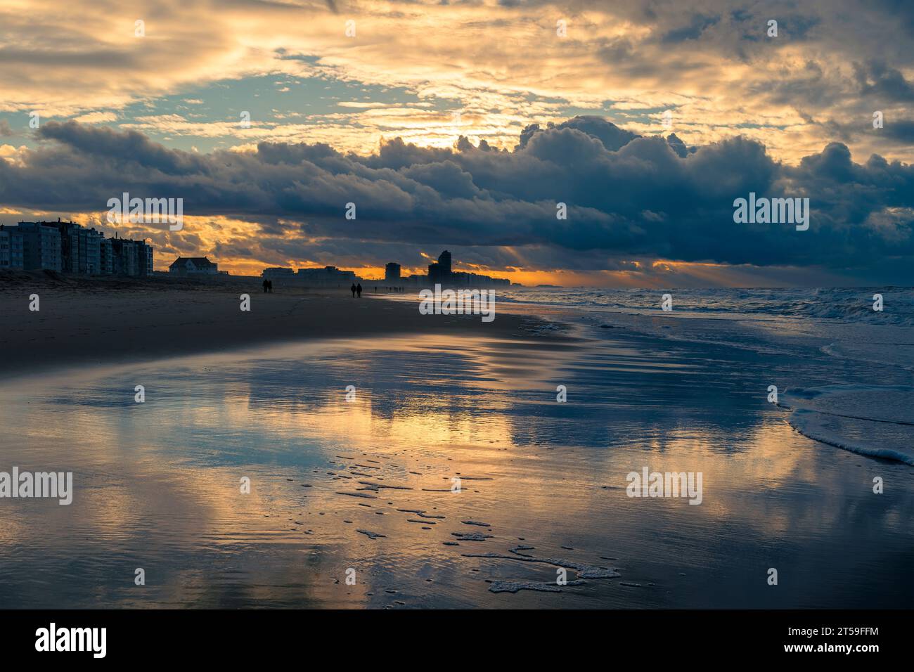Oostende beach at sunset with storm clouds, West Flanders, Belgium. Stock Photo