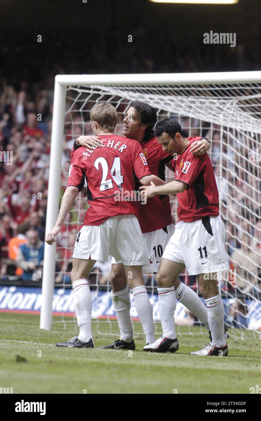 RUUD VAN NISTELROOY, FA CUP FINAL, 2004:Van Nistelrooy and the other Manchester Utd players celebrate his second goal and his team's third,  FA Cup Final 2004, Manchester United v Millwall, May 22 2004. Man Utd won the final 3-0. Photograph: ROB WATKINS Stock Photo