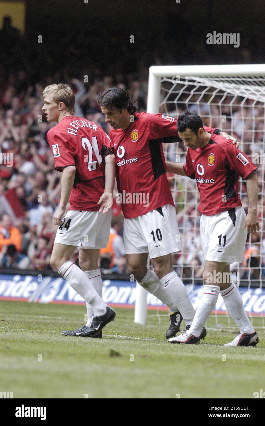 RUUD VAN NISTELROOY, FA CUP FINAL, 2004:Van Nistelrooy and the other Manchester Utd players celebrate his second goal and his team's third,  FA Cup Final 2004, Manchester United v Millwall, May 22 2004. Man Utd won the final 3-0. Photograph: ROB WATKINS Stock Photo