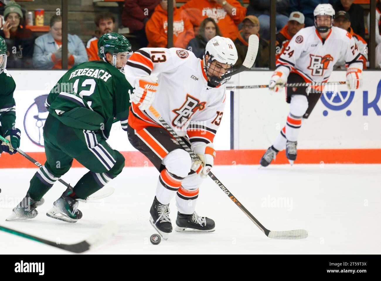 Bowling Green forward Brett Pfoh (13) skates with the puck against the ...
