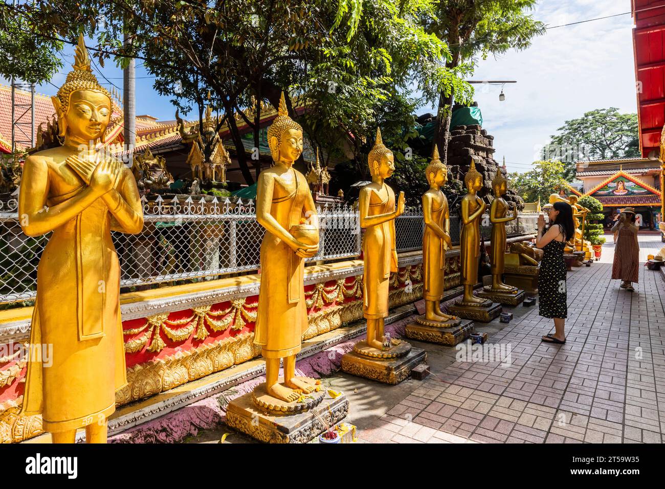 Wat Si Muang(Wat Simuong), standing Buddha statues, at coutyard, main hall, Vientiane, Laos, Southeast Asia, Asia Stock Photo
