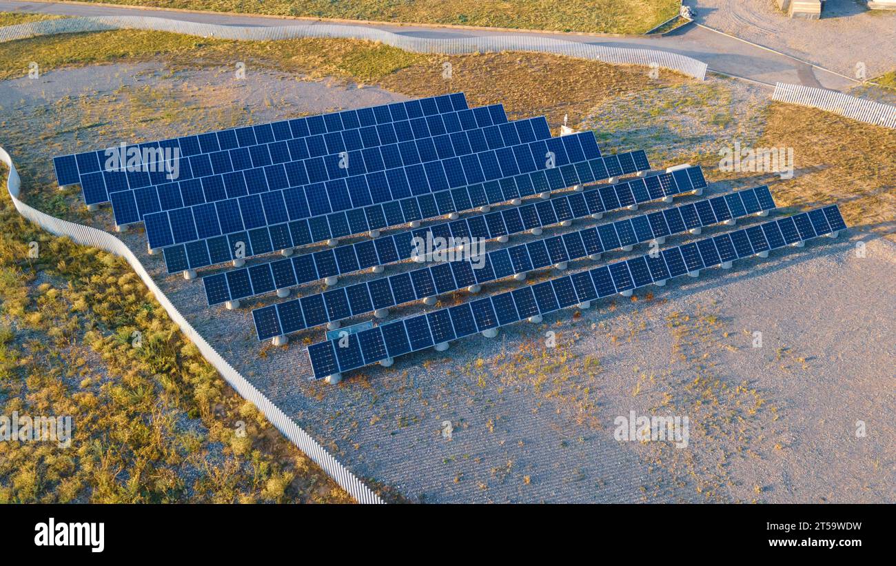 Rows of solar panels on the territory of the station. Green energy ...