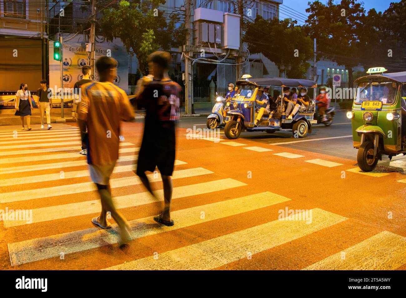 BANGKOK, THAILAND, OCT 28 2023, People walk on pedestrian zebra