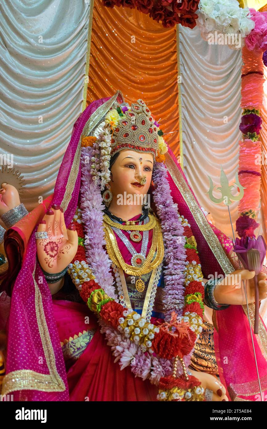 A beautiful idol of Maa Durga being worshipped at a pandal during Navratri in Mumbai, India Stock Photo