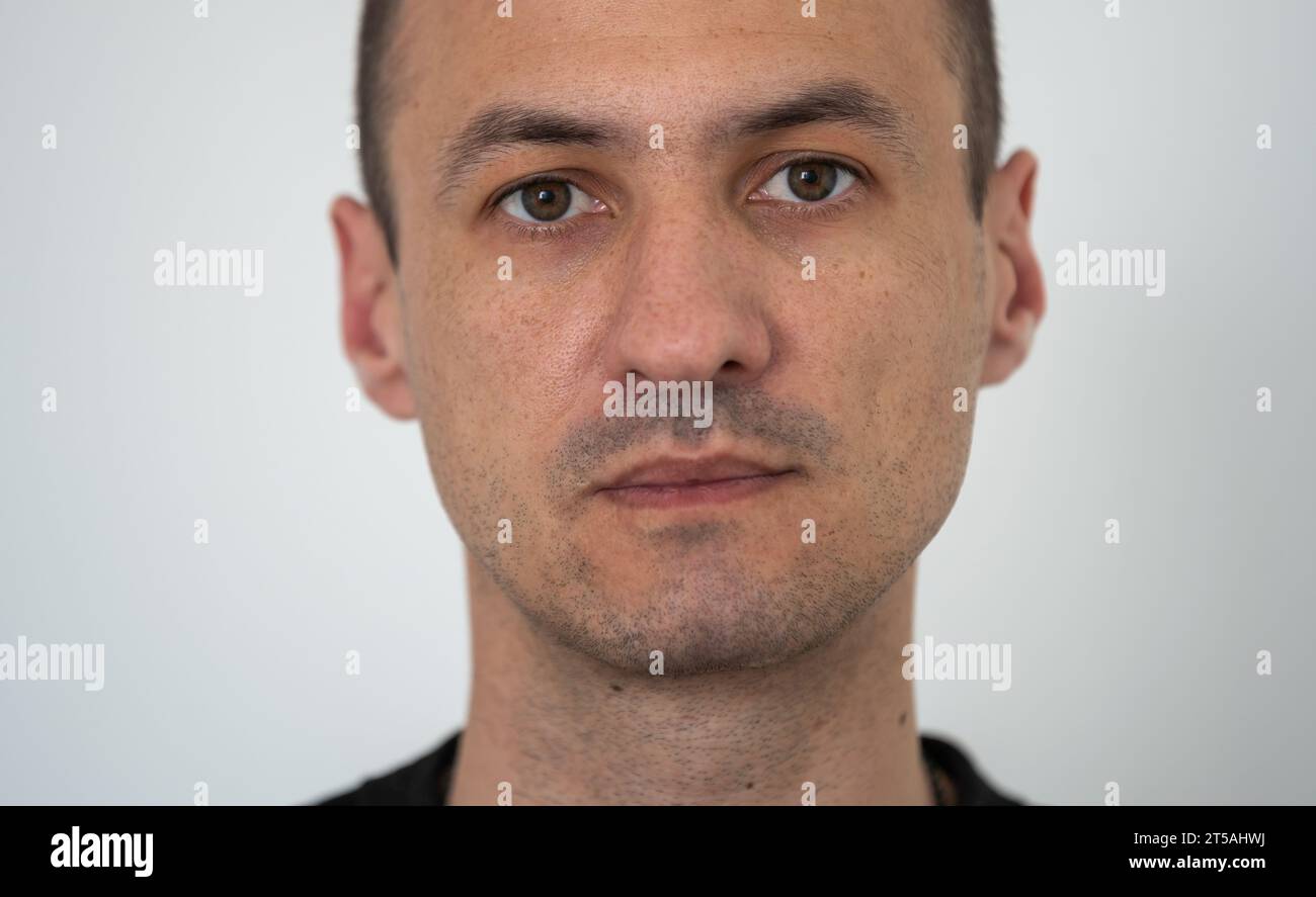 Portrait of a young man, isolated on background Stock Photo