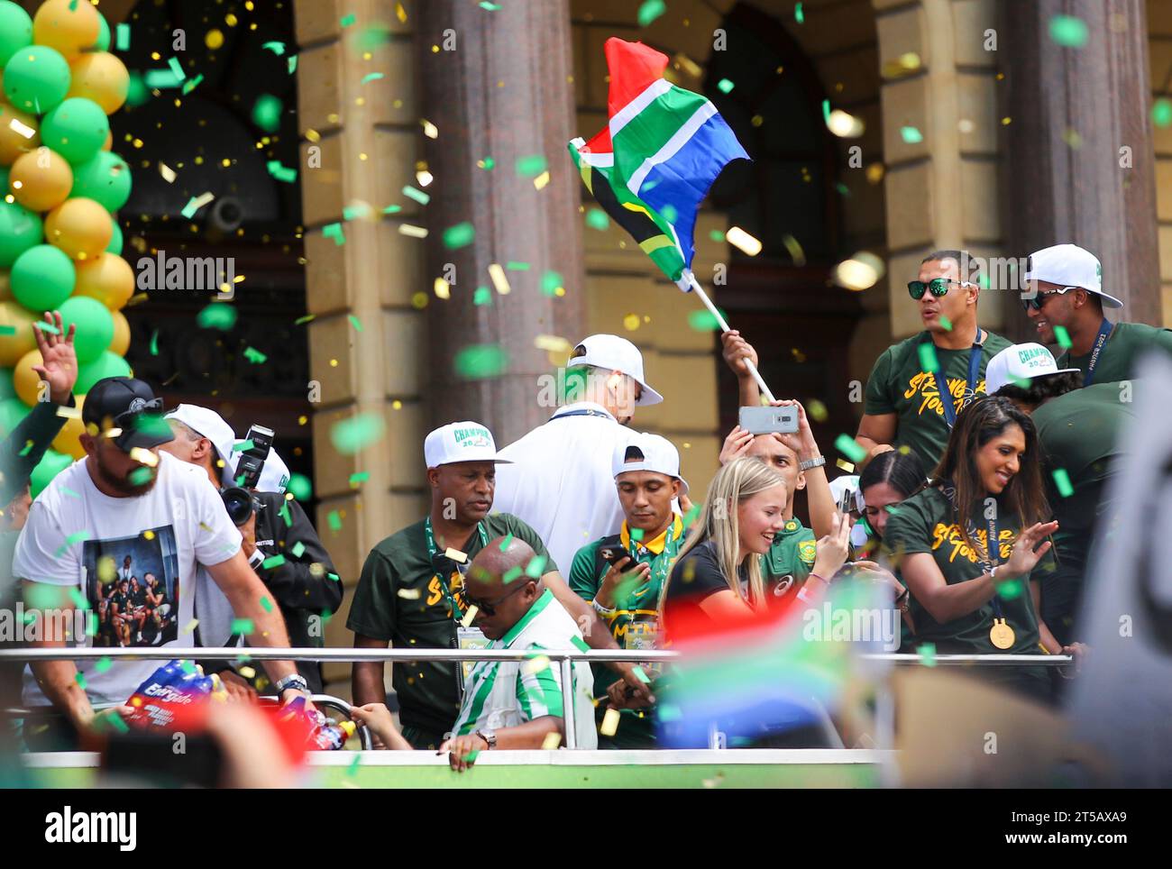 CAPE TOWN, SOUTH AFRICA - NOVEMBER 03: Cheslin Kolbe, right, on top of the bus during the Springbok Trophy tour in Cape Town on November 03, 2023 in Cape Town, South Africa. The Springboks beat the New Zealand All Blacks 12-11 to win the Rugby World Cup in Paris, France on Saturday 28 October 2023. (Photo by Roger Sedres) Stock Photo