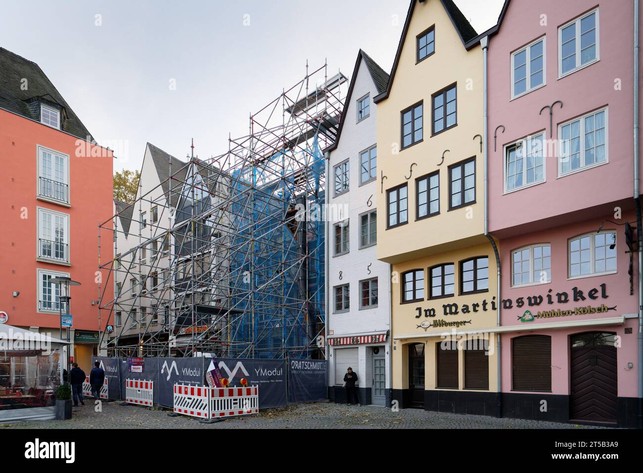 Cologne, Germany November 03 2033: two of the historic gabled houses at Cologne's fish market have to be dismantled due to the risk of collapse Stock Photo