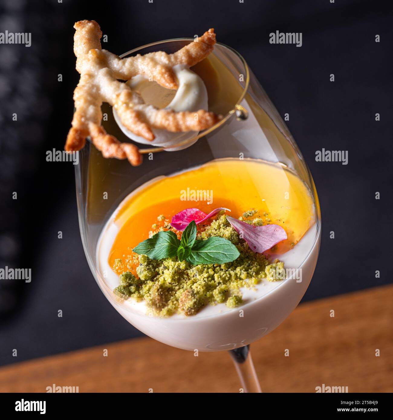 Delicious double colored mango panna cotta mousse pudding with diced