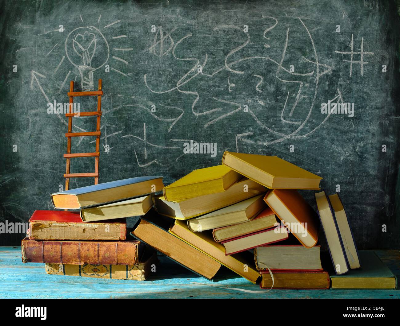 Education gives orientation,books,blackboard and ladder of success