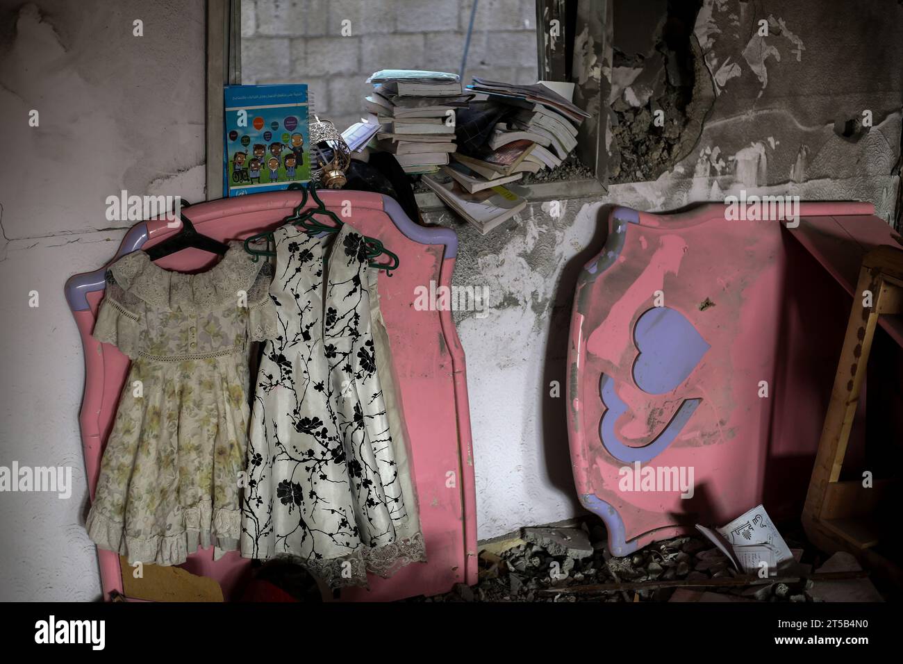 Gaza, Palestine. 03rd Nov, 2023. Children dresses hang on the wall of a room in a house bombed by Israeli aircraft in the city of Khan Yunis. Thousands of civilians, both Palestinians and Israelis, have died since October 7, 2023, after Palestinian Hamas militants based in the Gaza Strip entered southern Israel in an unprecedented attack triggering a war declared by Israel on Hamas with retaliatory bombings on Gaza. Credit: SOPA Images Limited/Alamy Live News Stock Photo