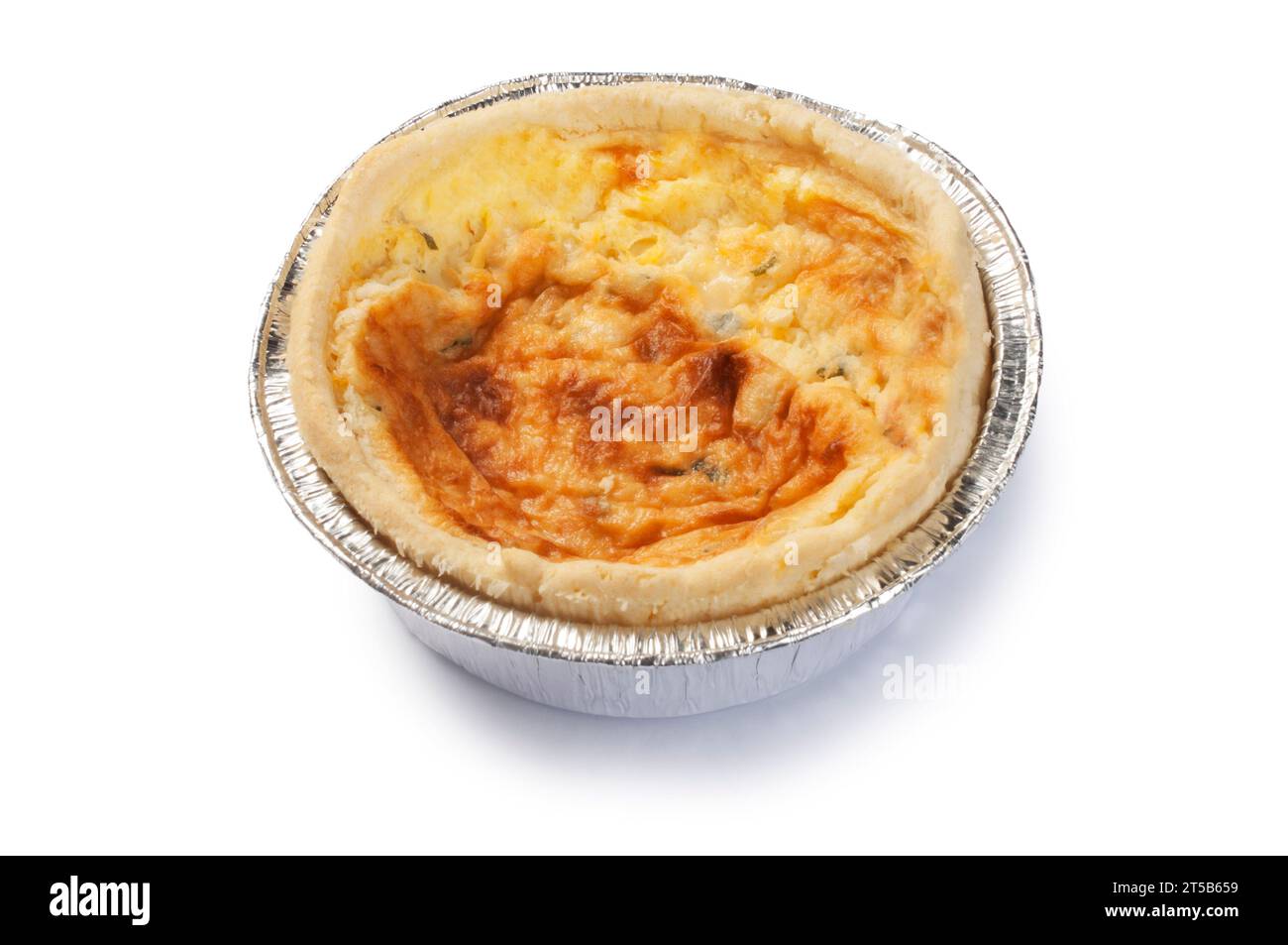 Studio shot of a small individual cheese and onion quiche cut out against a white background - John Gollop Stock Photo