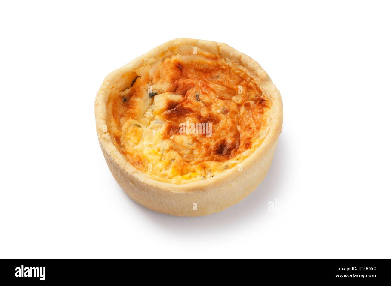 Studio shot of a small individual cheese and onion quiche cut out against a white background - John Gollop Stock Photo