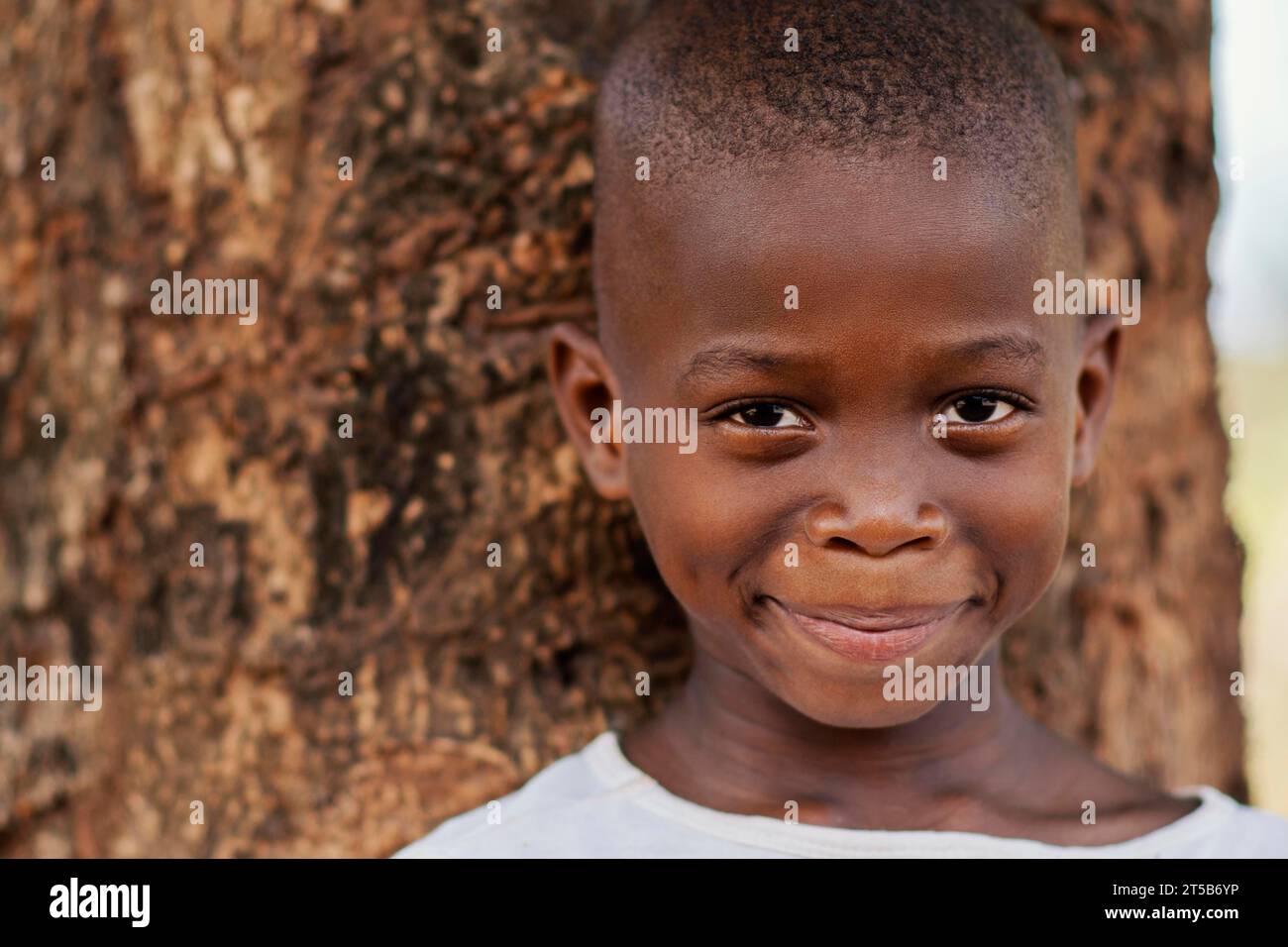 Close up smiley african kid outdoors Stock Photo