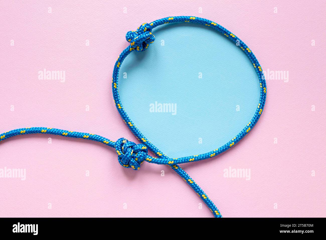 Copy space blue rope knot loop Stock Photo - Alamy