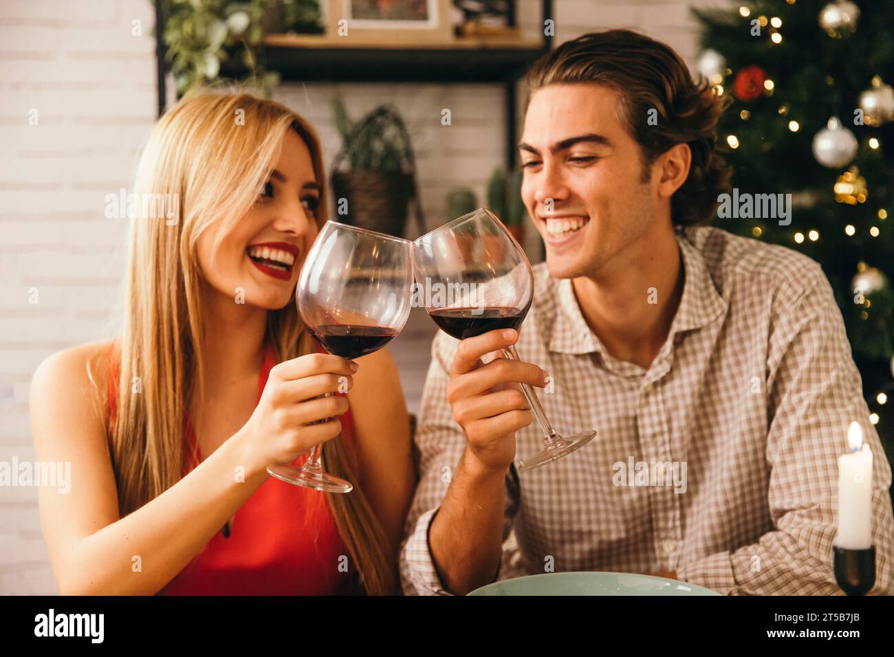 Happy couple christmas dinner Stock Photo
