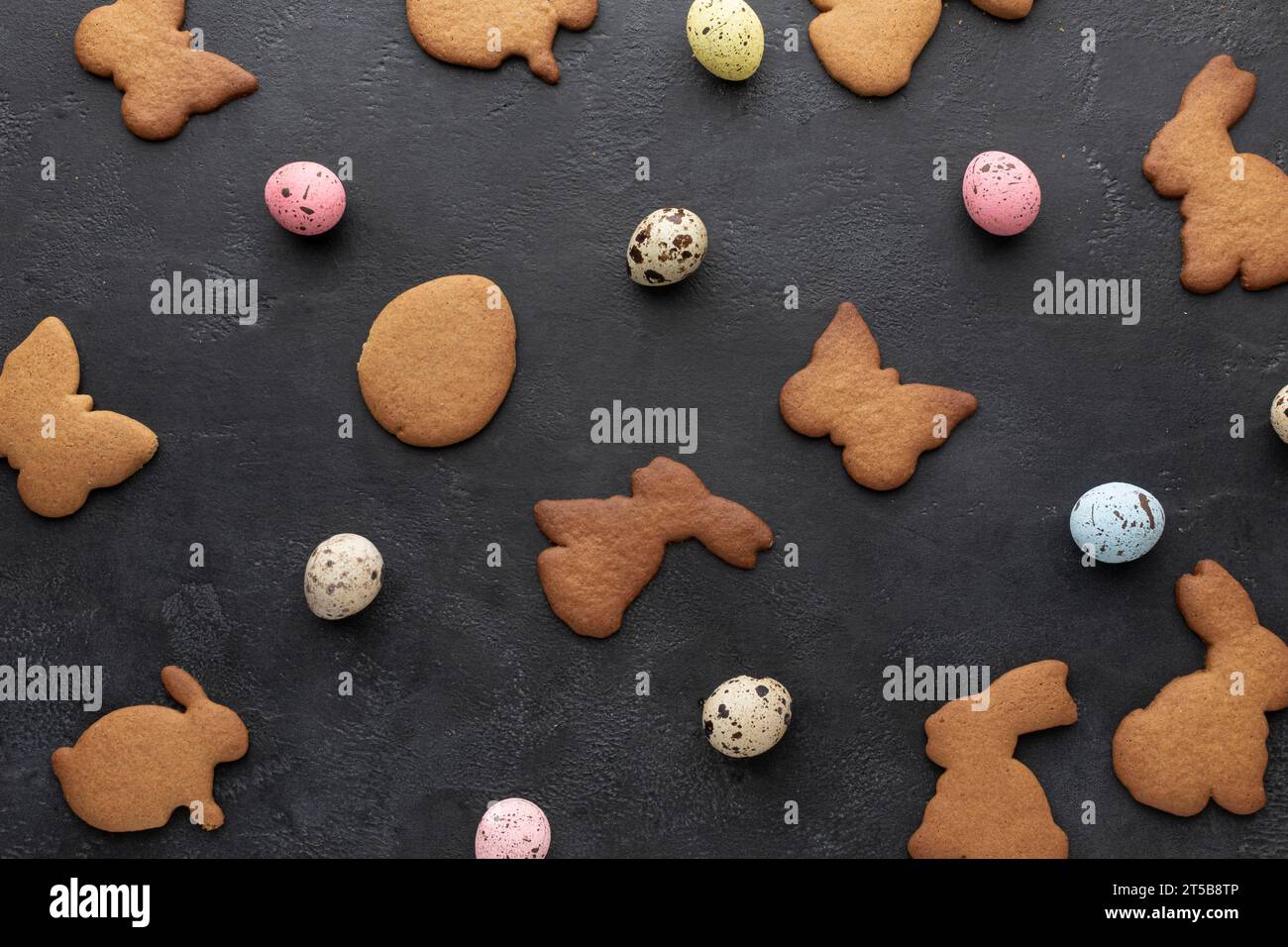 Top view eggs bunny shaped cookies easter Stock Photo