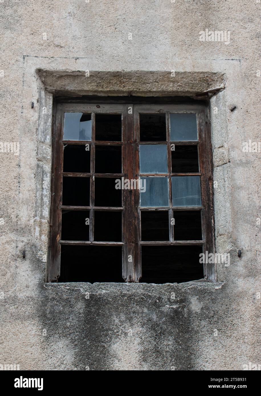 Old window with broken panes, France Stock Photo