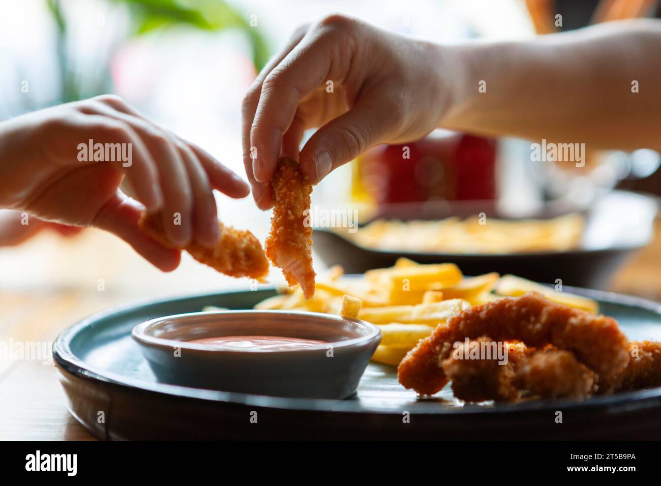 Close up hands holding food Stock Photo - Alamy