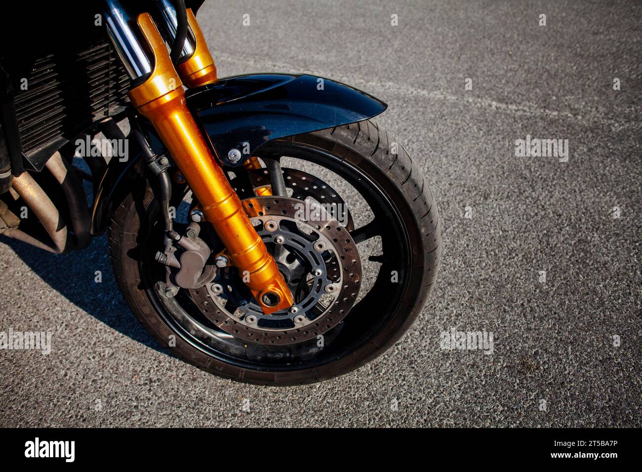 Front tire orange motorbike Stock Photo Alamy