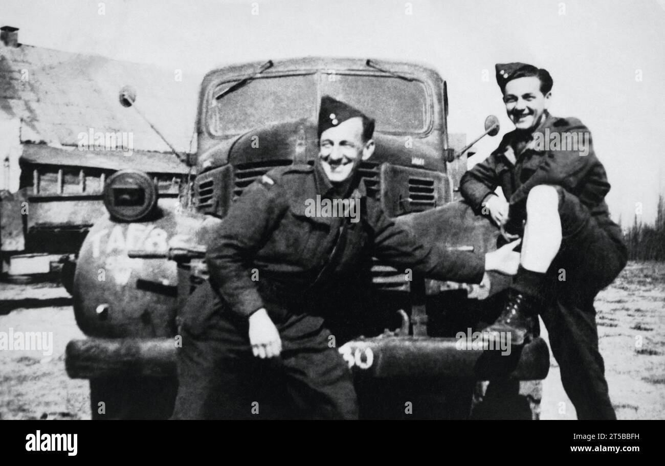RAF ground crew  and a Dodge truck of 85 Group, 2nd Tactical Air Force. Taken in Melsbroek, Belgium, March 1945. Stock Photo