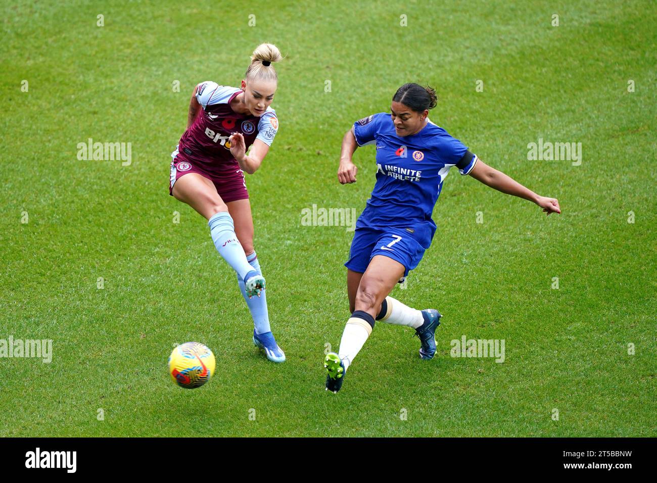 Aston Villa's Alisha Lehmann (left) and Chelsea's Jessica Carter battle for the ball during the Barclays Women's Super League match at the Poundland Bescot Stadium, Walsall. Picture date: Saturday November 4, 2023. Stock Photo