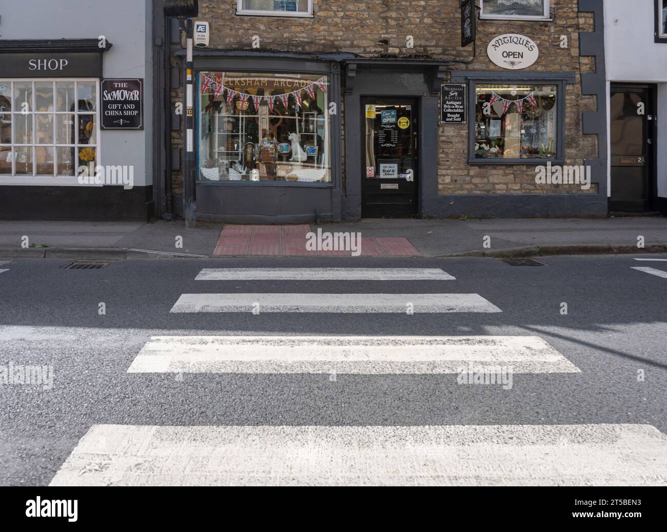 Zebra crossing and shop in the town of Melksham, Wiltshire, UK Stock Photo Alamy