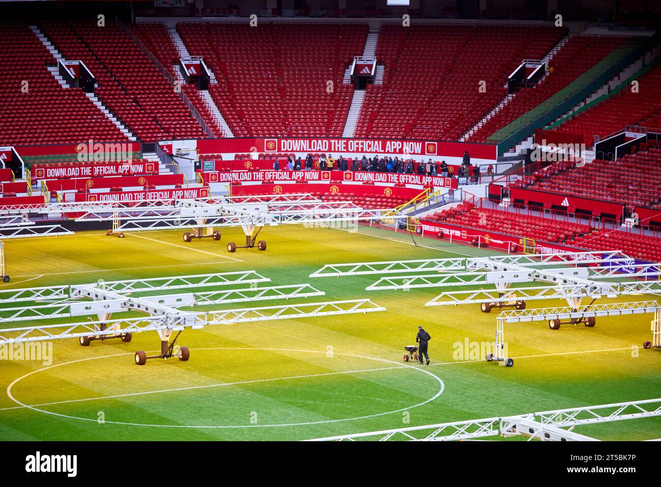 MUFC Manchester United FC ground pitch being treated after a game. . Stock Photo
