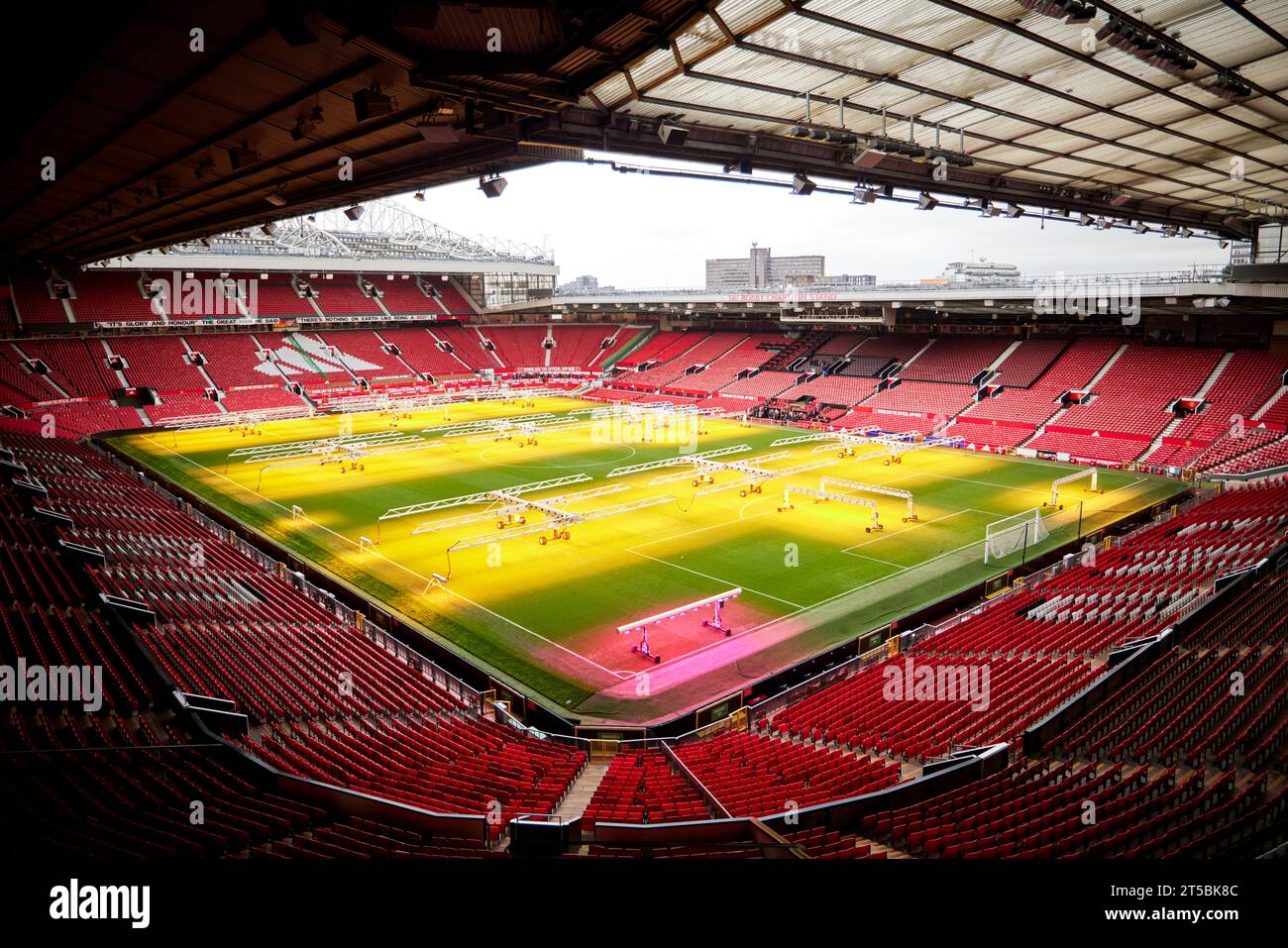 MUFC Manchester United FC ground pitch being treated after a game. . Stock Photo