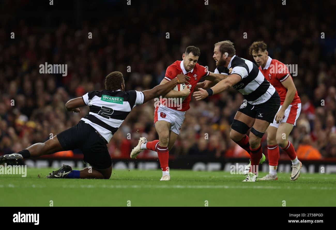 Cardiff, UK. 04th Nov, 2023. Tomos Williams of Wales breaks away from a tackle from Alun Wyn Jones of the Barbarians (r). Wales v Barbarians at the Principality Stadium in Cardiff on Saturday 4th November 2023. pic by Andrew Orchard/Andrew Orchard sports photography/ Alamy Live News Credit: Andrew Orchard sports photography/Alamy Live News Stock Photo