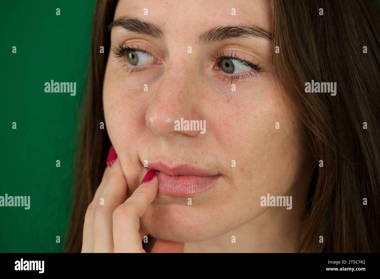 Face expression suffering from sensitive teeth and cold, asian young woman, girl feeling hurt