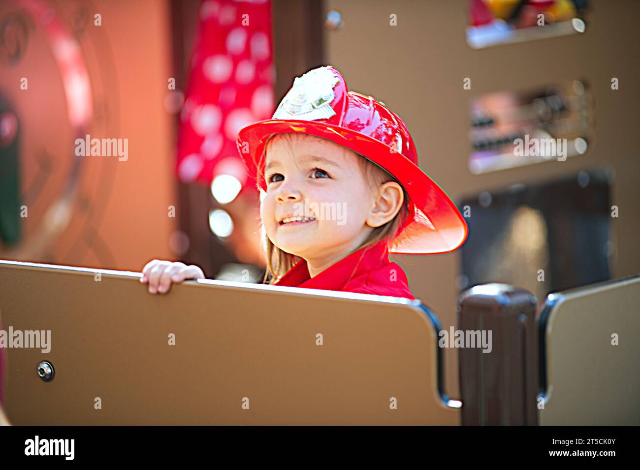 Halloweenpalooza - Dennis, Massachusetts on Cape Cod.  A family celebration of Halloween. A young 'fireman' at the event. Stock Photo