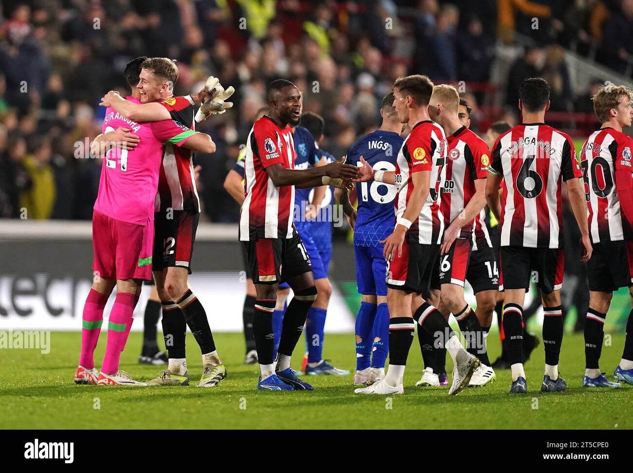 Brentford goalkeeper Thomas Strakosha (left) and team-mate Nathan Collins celebrate victory after the final whistle in the Premier League match at the Gtech Community Stadium, London. Picture date: Saturday November 4, 2023. Stock Photo