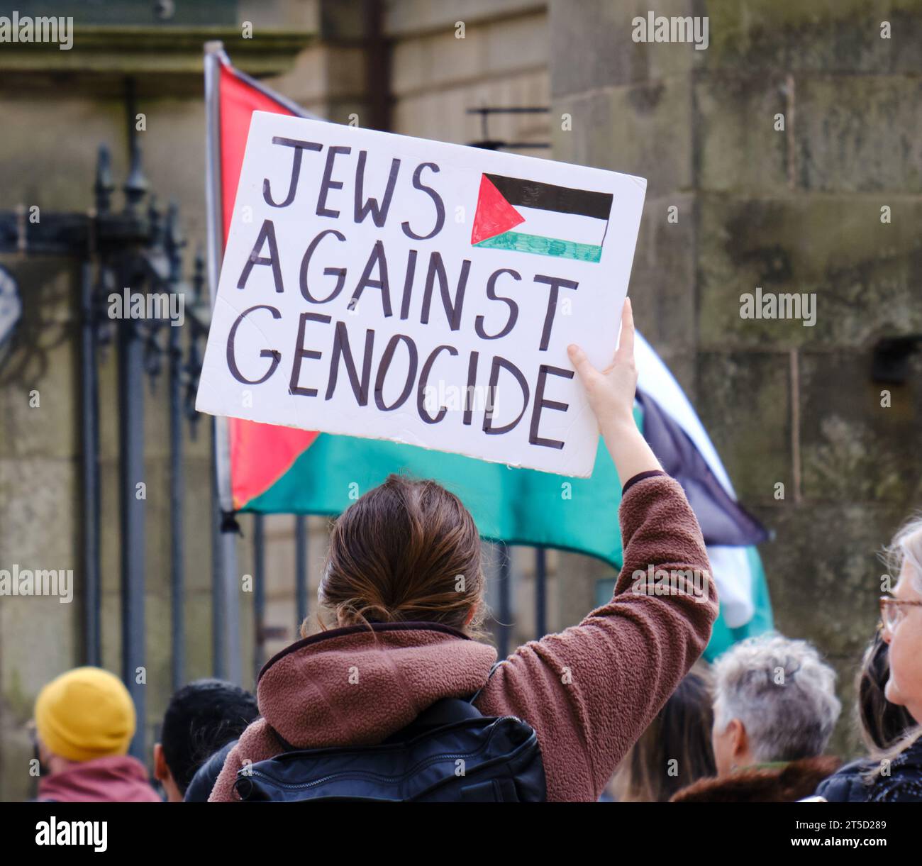 Halifax, Nova Scotia, Canada. November 4th, 2023.  'jews against genocide' sign at rally to demand immediate ceasefire in Palestine as Israel continues its attacks. The rally was held in front of the Provincial Legislature. Credit: meanderingemu/Alamy Live News Stock Photo