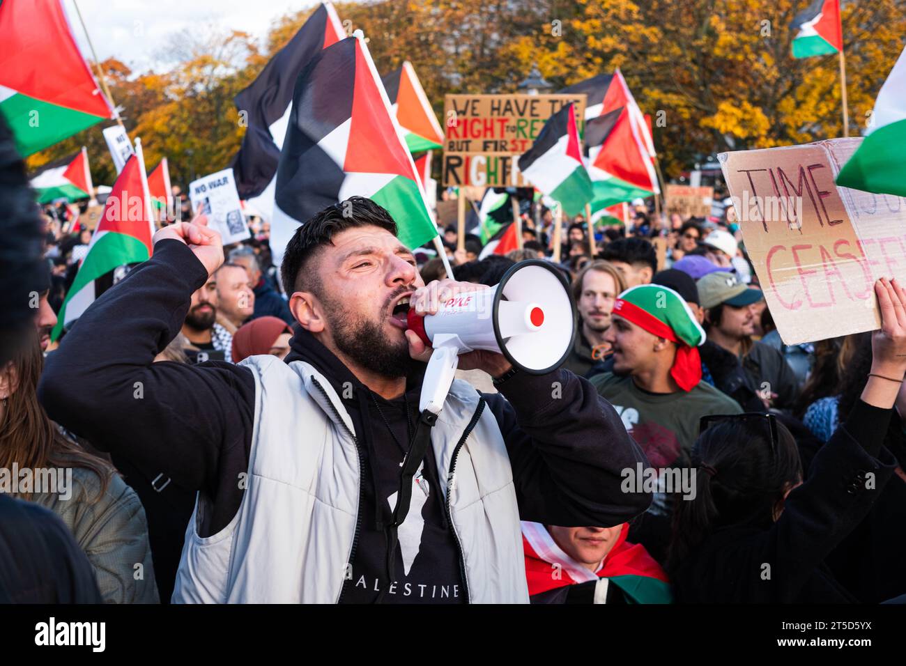 Berlin, Germany - November, 4: Man shouting in megaphone on Free Palestine Demonstration in Berlin Stock Photo