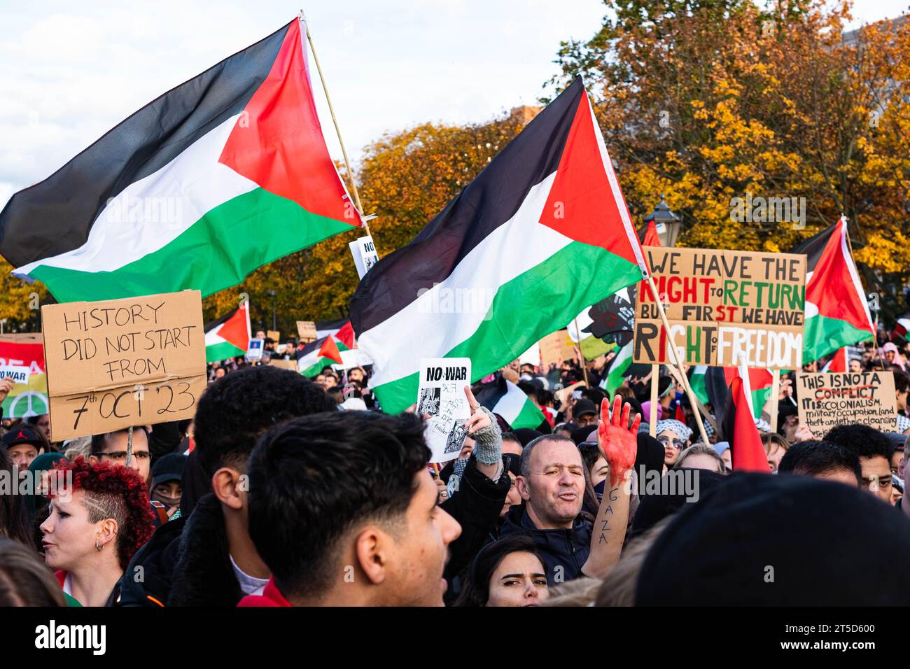 Berlin, Germany - November, 4: People with palestinian flags and sign on Free Palestine Demonstration in Berlin Stock Photo