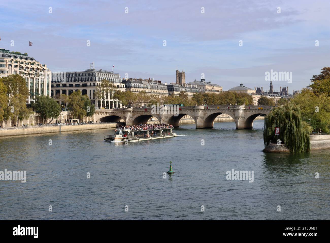 Tourist boat on Seine river in Paris, France Stock Photo