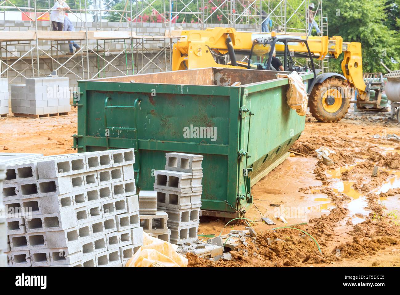 An empty dumpster for construction waste debris near construction site
