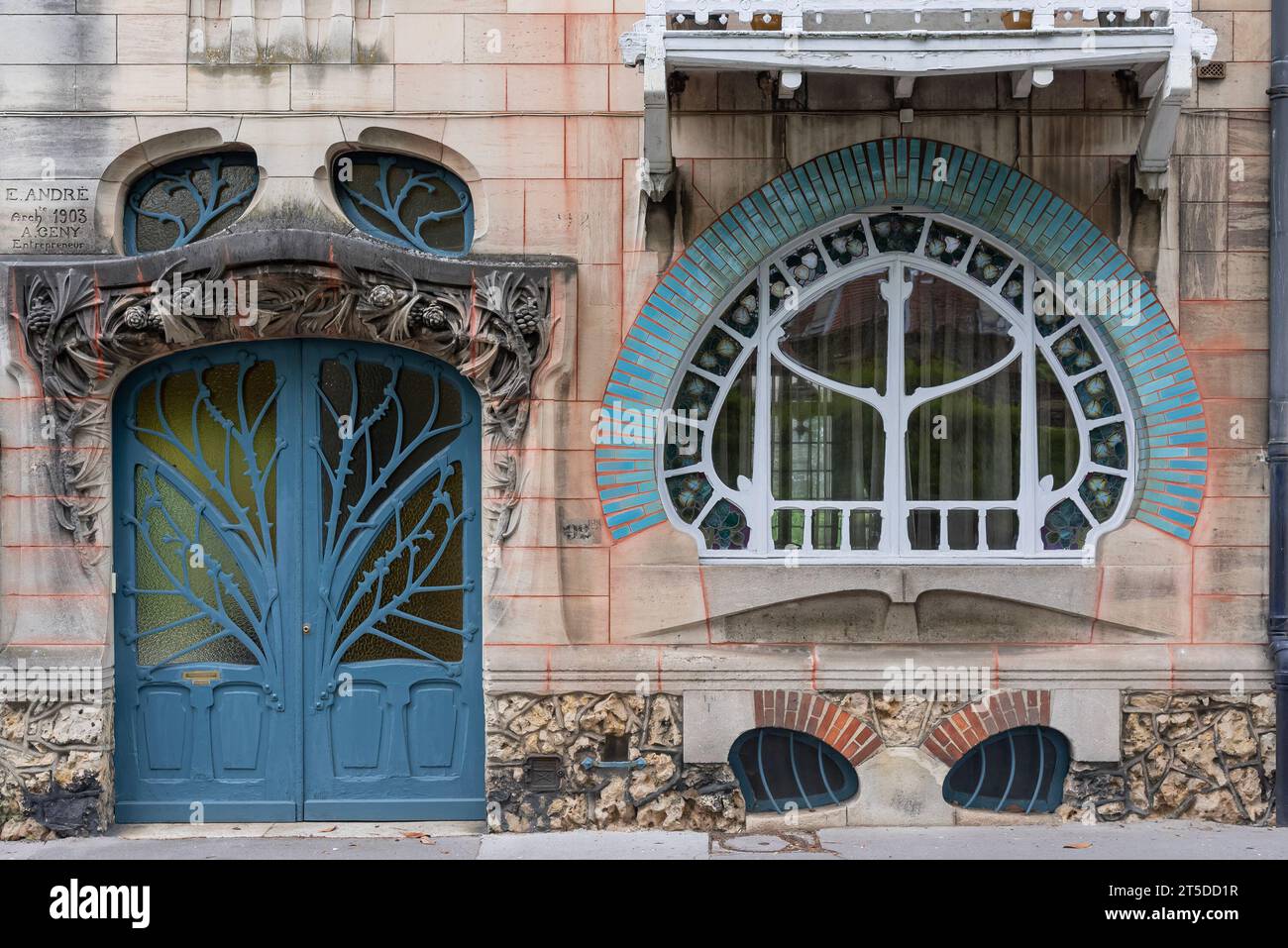 Focus on Art Nouveau style Maison Huot build in 1903 by Emile André with water lily shaped window Stock Photo