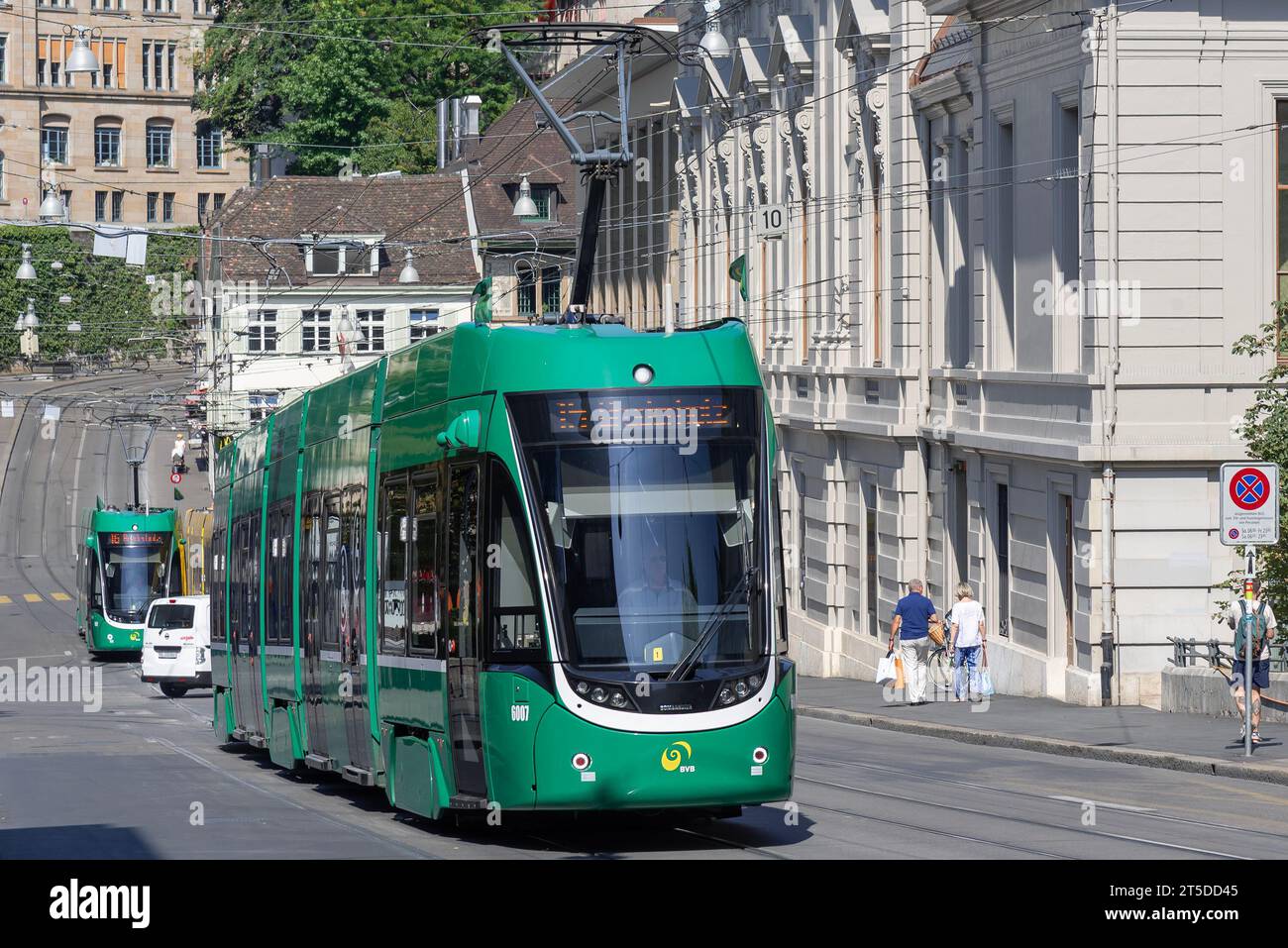 Basel, Switzerland - Green tram Bombardier Flexity 2 in a street. Stock Photo