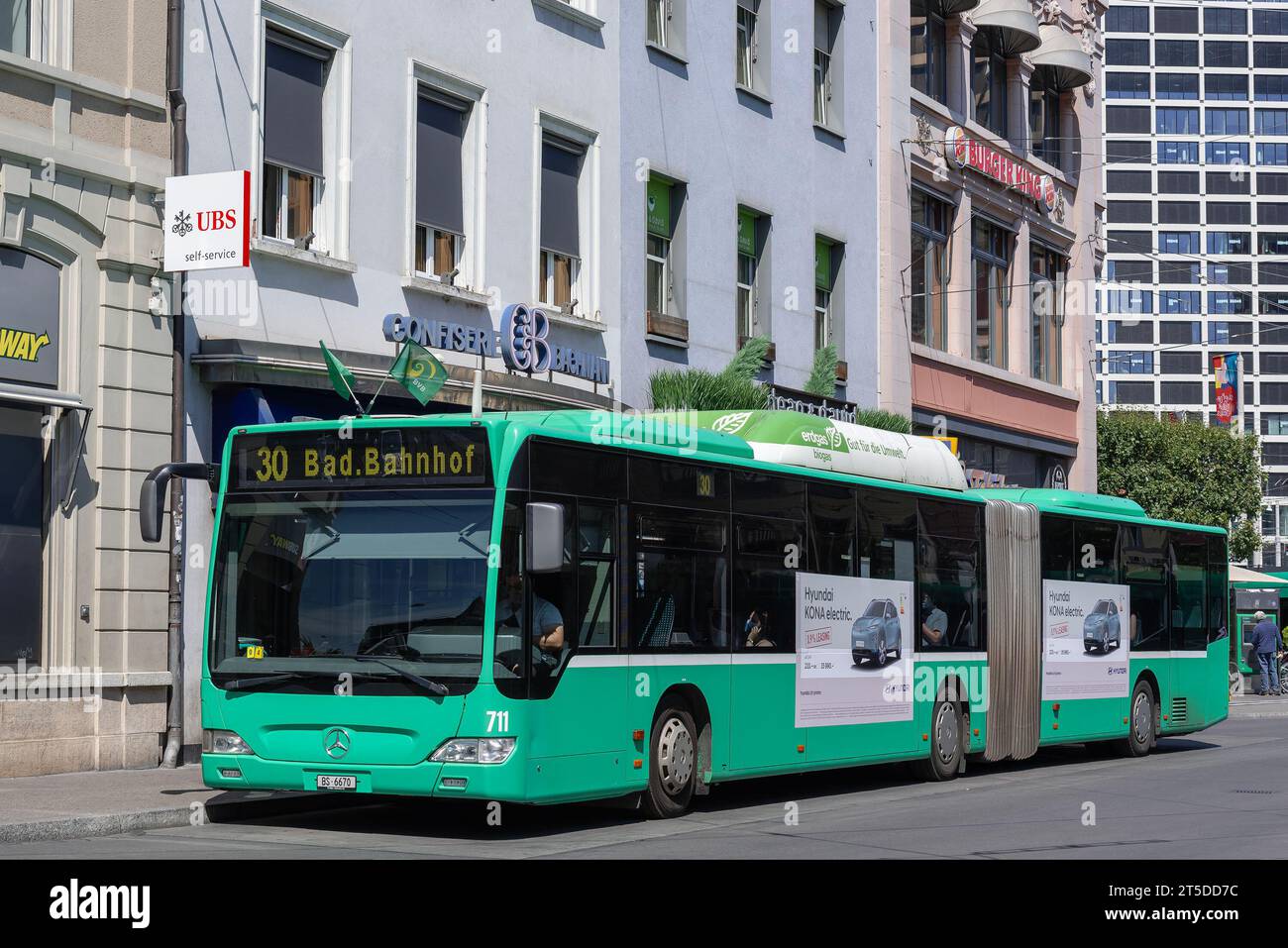 Basel, Switzerland - Green bus Mercedes-Benz Citaro in a street. Stock Photo