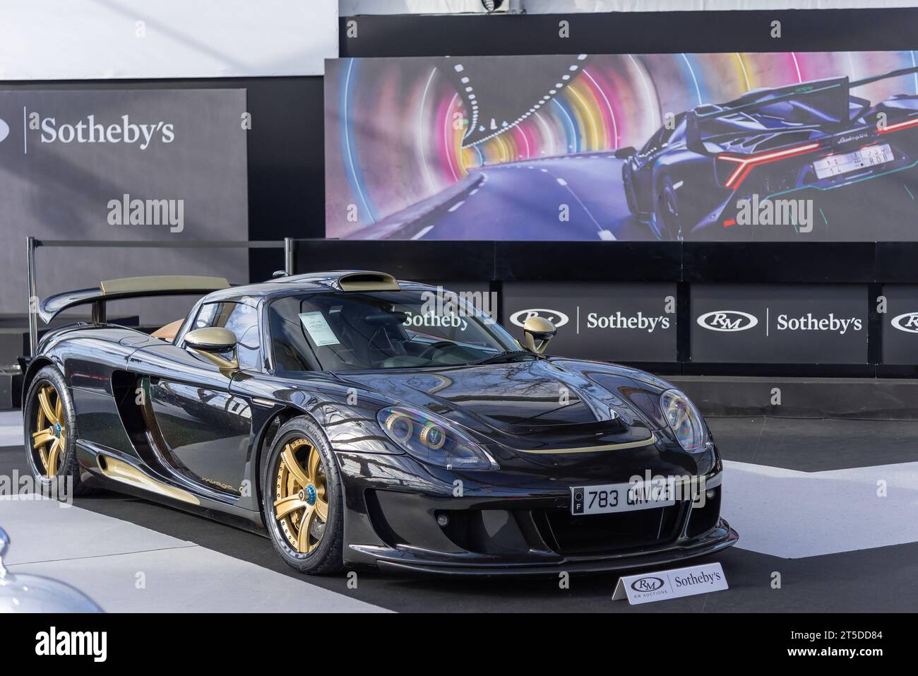 Paris, France - RM Sotheby's Paris 2020. Focus on a glittery black 2005 Porsche Gemballa Mirage GT Gold Edition. Chassis no. WP0ZZZ98Z5L000102. Stock Photo