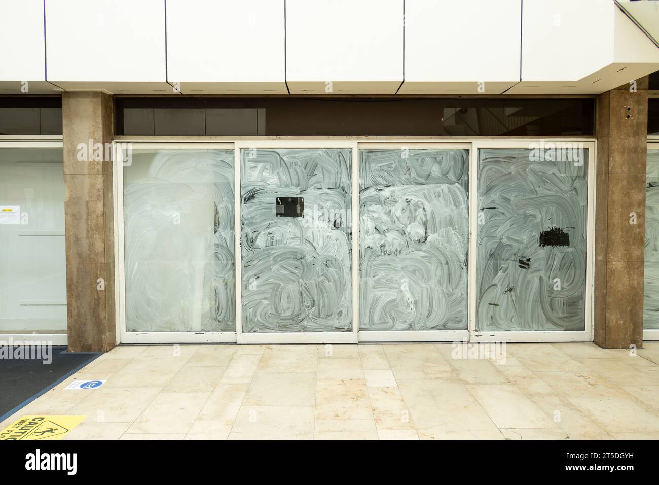 Closed store window, in shopping mall, economic turndown concept Stock ...