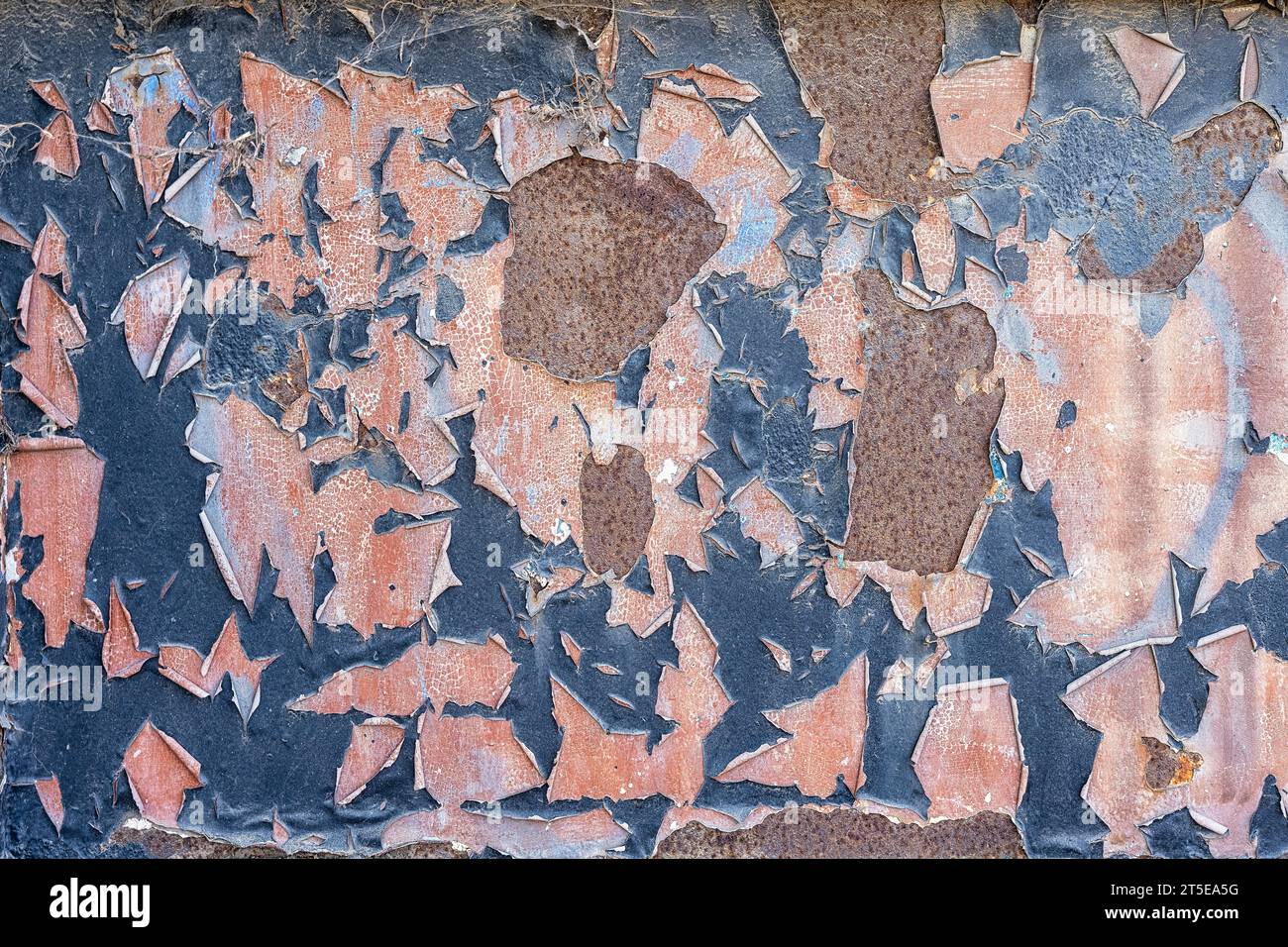 Peeling old blue paint with rust. Abstract background pattern Stock Photo